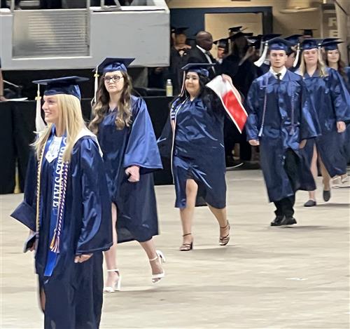 Students in Bob Jones caps and gowns in procession